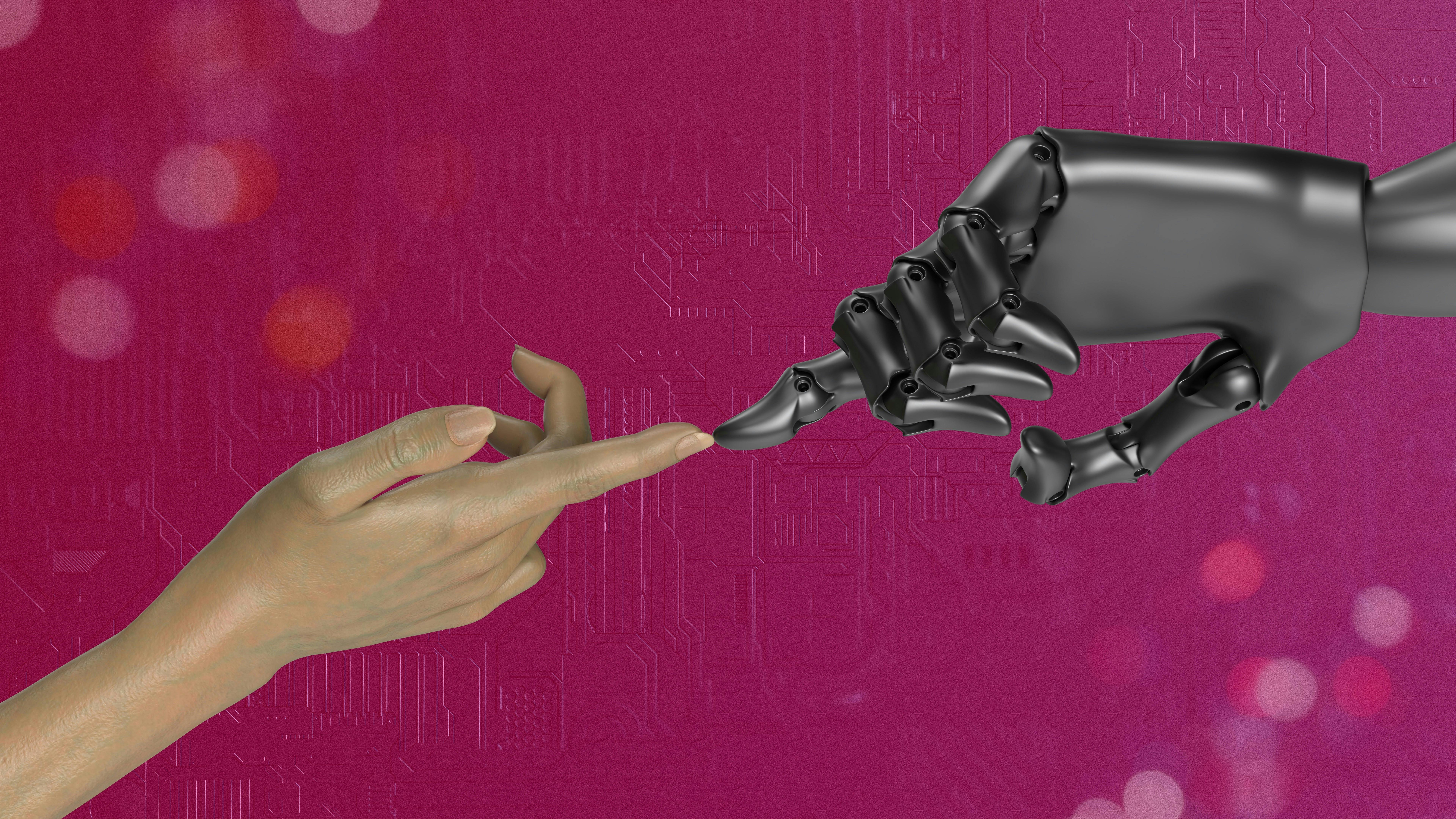 Main humaine touchant main de robot
