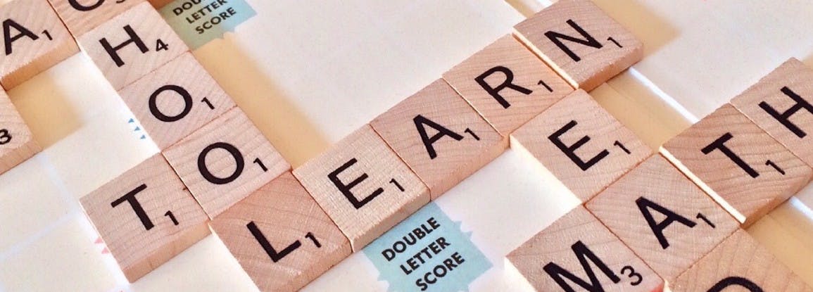 Scrabble with the highlighted word "Learn"