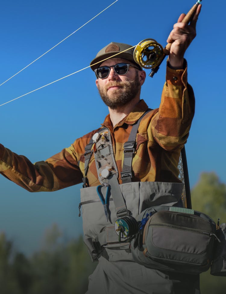 Man fishing wearing ROKA sunglasses 