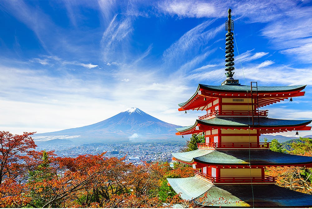 Japanese temple with Mount Fuji in the distance