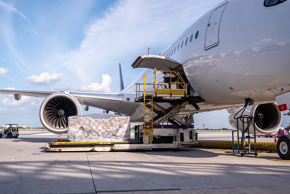 Parcels being loaded onto a freight airplane