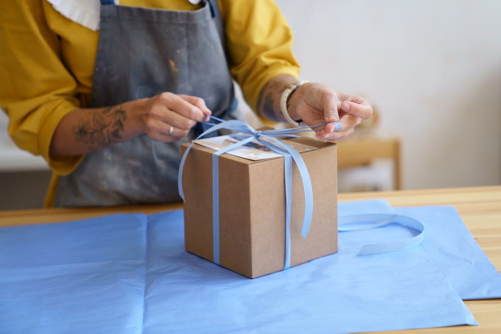 Customer wrapping a gift parcel