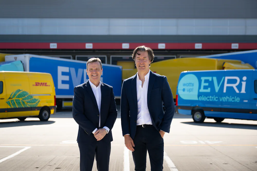Martijn de Lange, CEO of Evri, with Pablo Ciano, CEO of DHL eCommerce in front of Evri and DHL vehicles