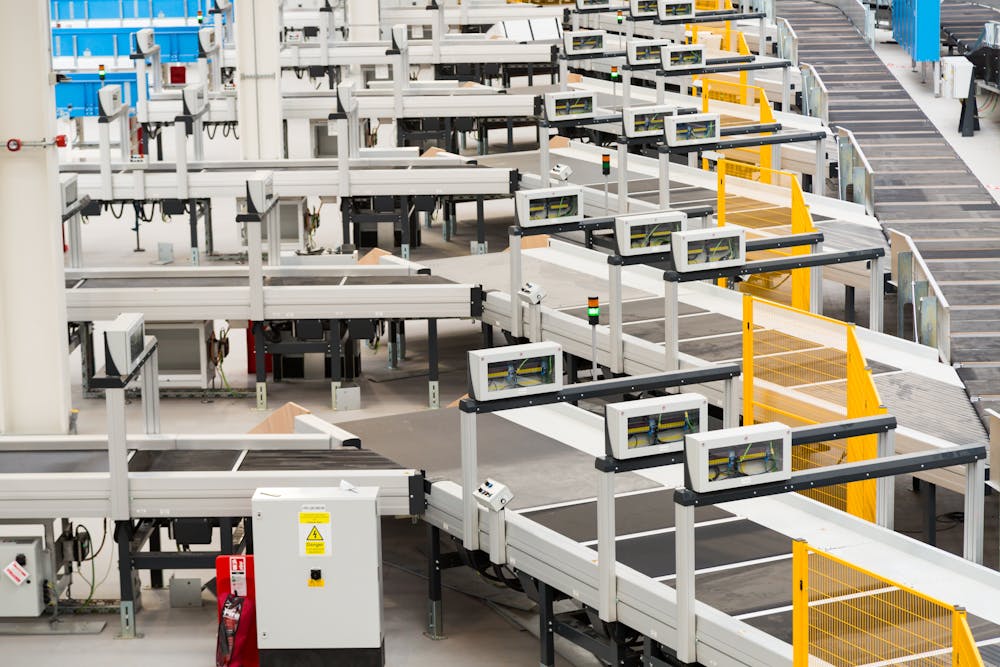 A close-up of the machines processing parcels
