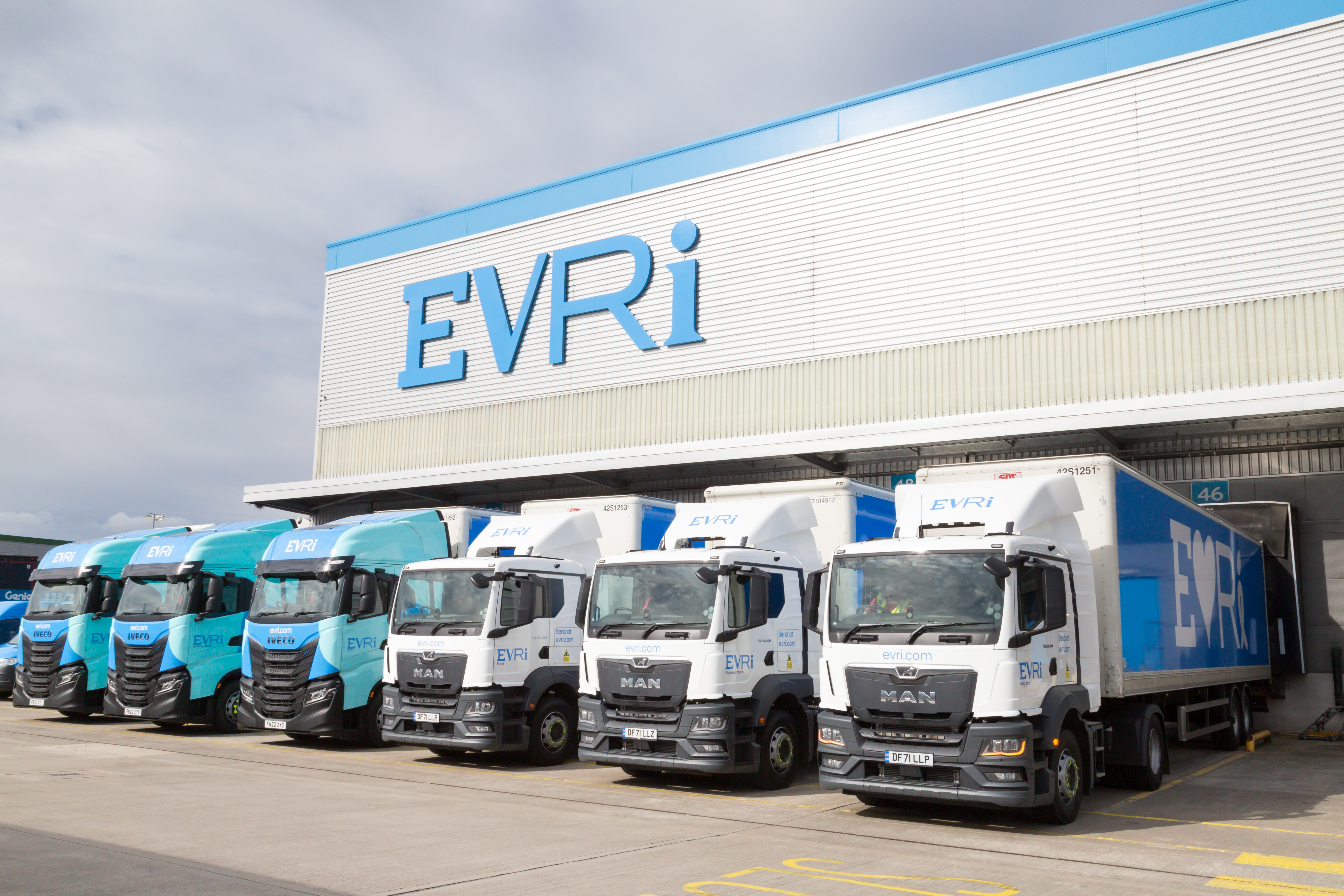 A fleet of Evri branded HGVs are lined up at an Evri depot