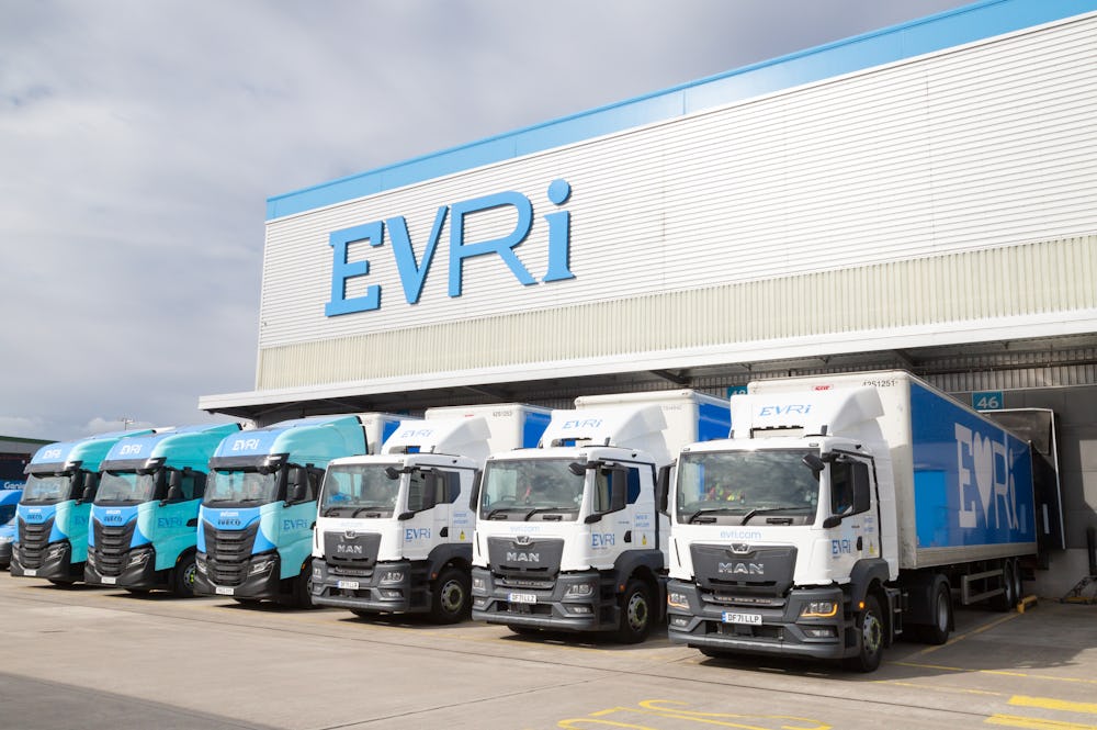 A fleet of Evri branded HGVs are lined up at an Evri depot