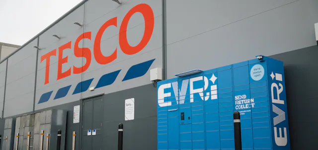 A blue Evri parcel locker outside a Tesco store