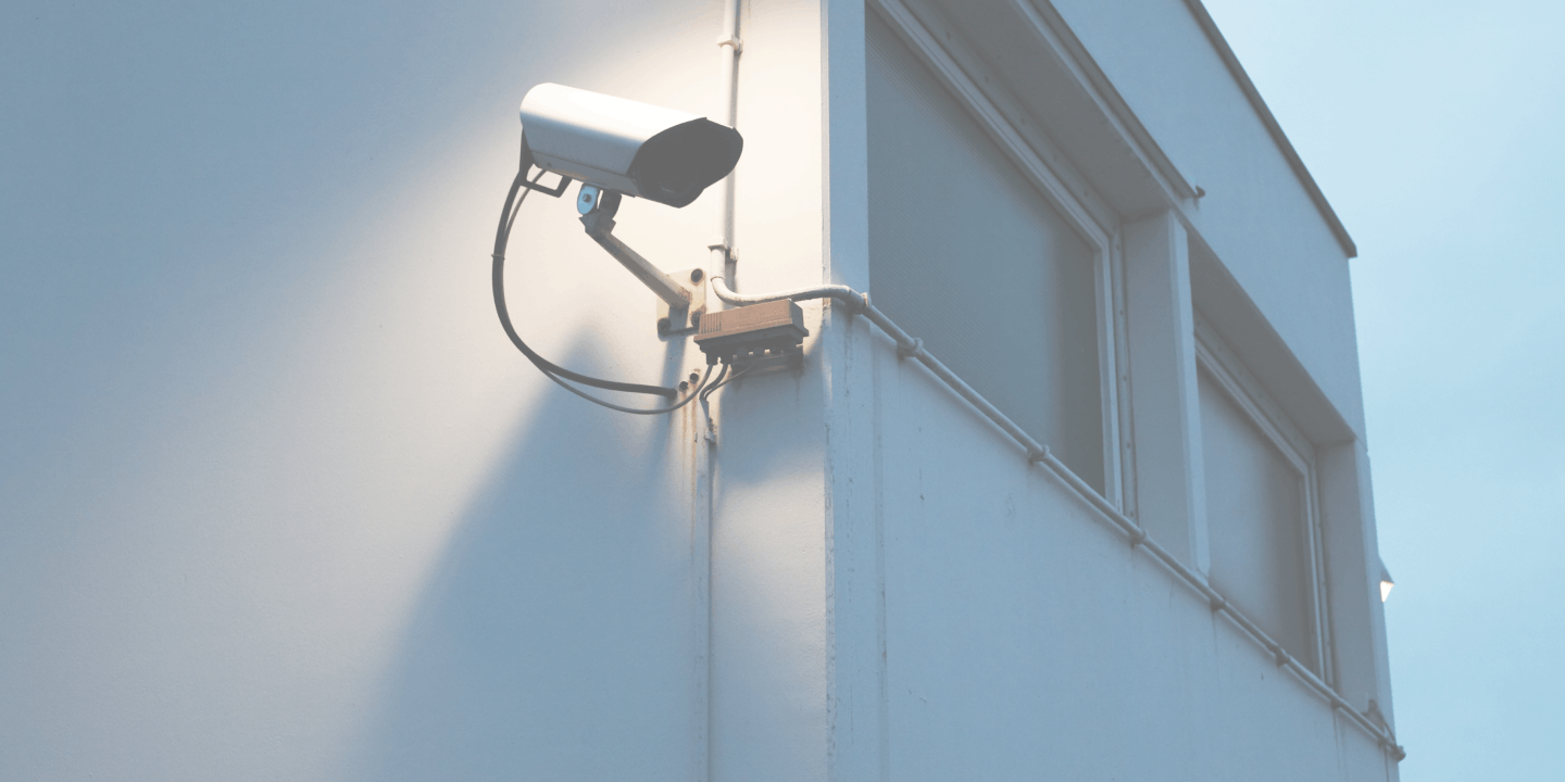 video surveillance camera on building wall