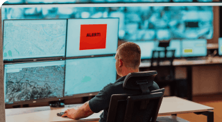 security operator looking at an alert on screen