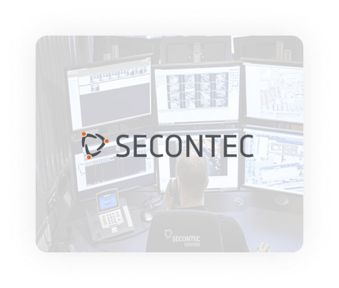 SECONTEC logo on semi-transparent background showing a busy operator in a control room working on multiple screens