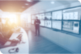 Blurred photo of modern control room with incoming sun rays 