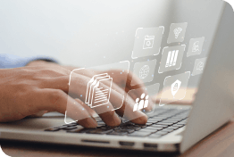 Close up of hands typing on a thin laptop with floating security icons