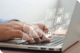 Close up of hands typing on a thin laptop with floating security icons 