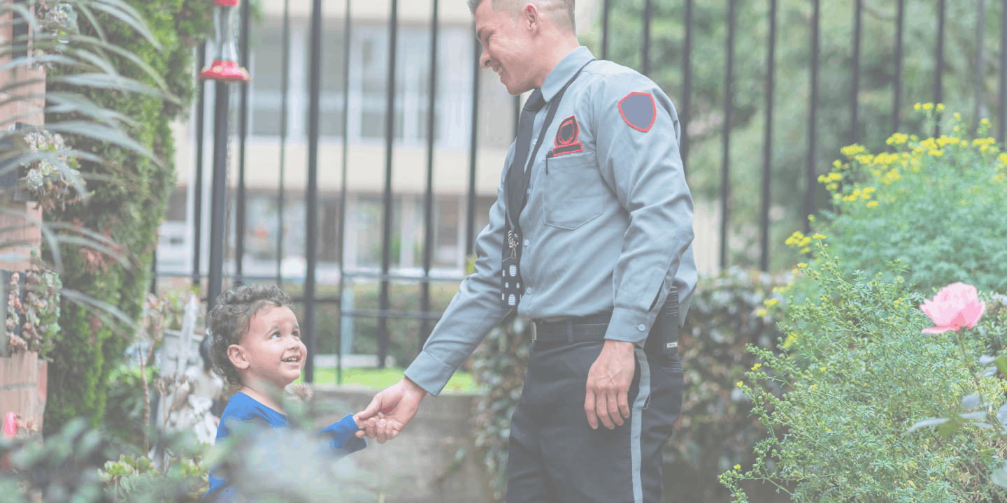 Latino boy leaves his house to greet the guard who takes care of the security of the municipality