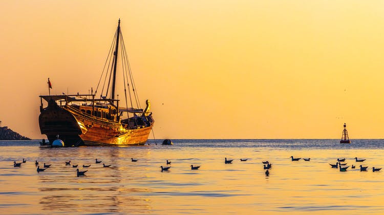 Boutre au coucher du soleil