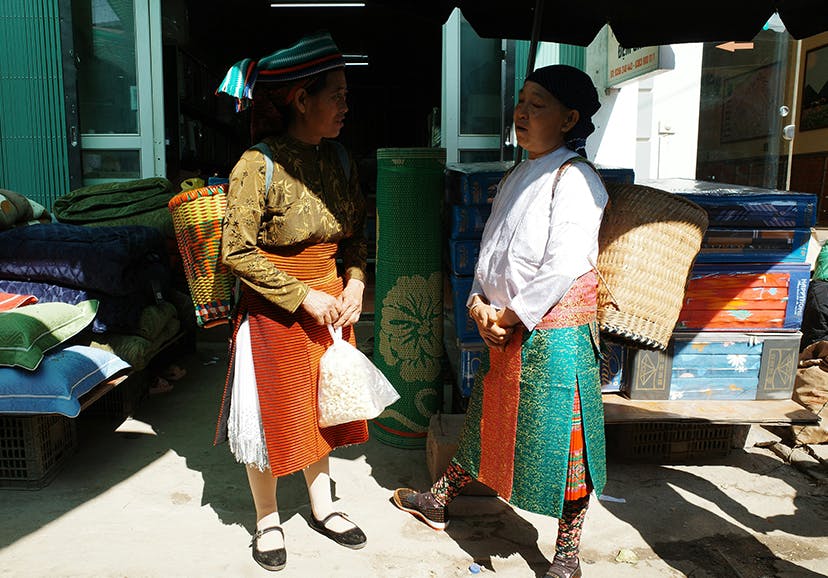 two persons facing each other