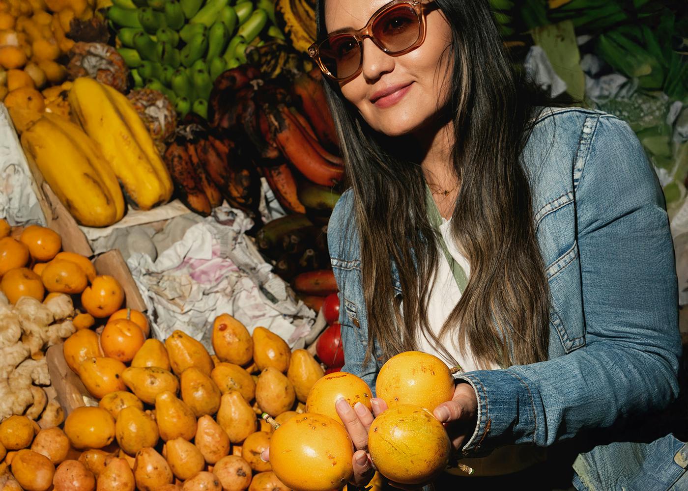 woman with oranges