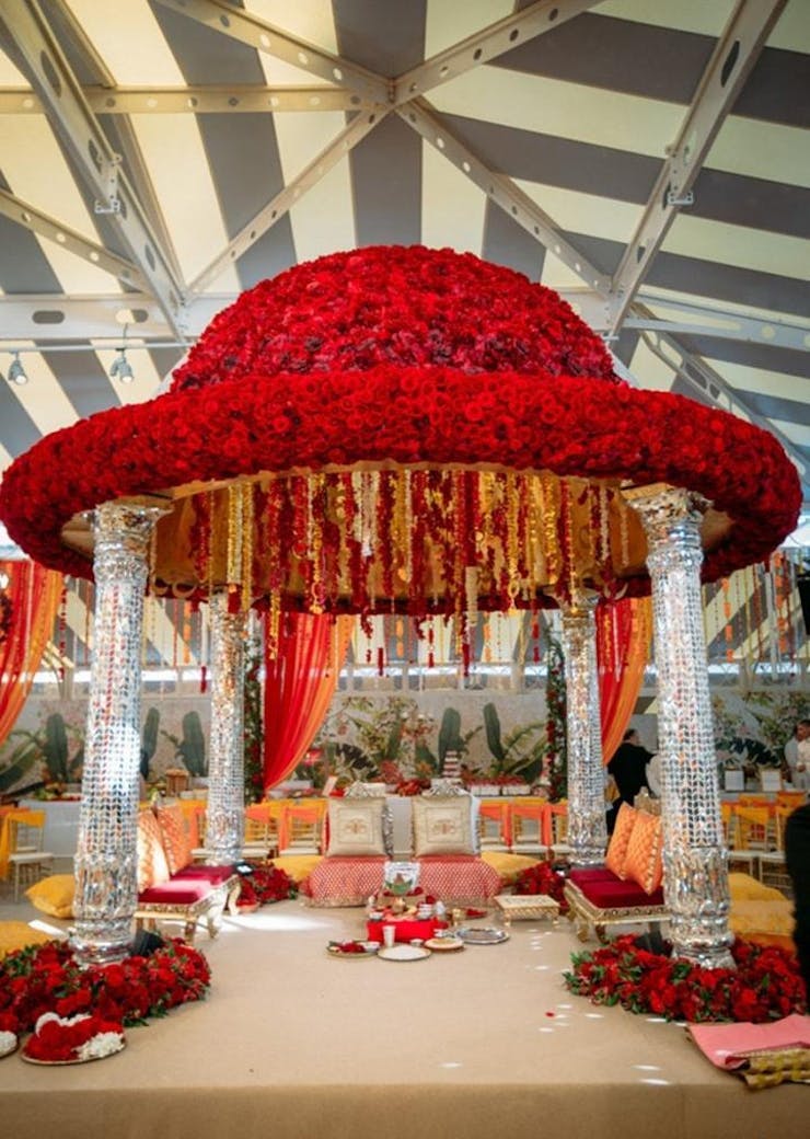 wedding mandap decor with red roses