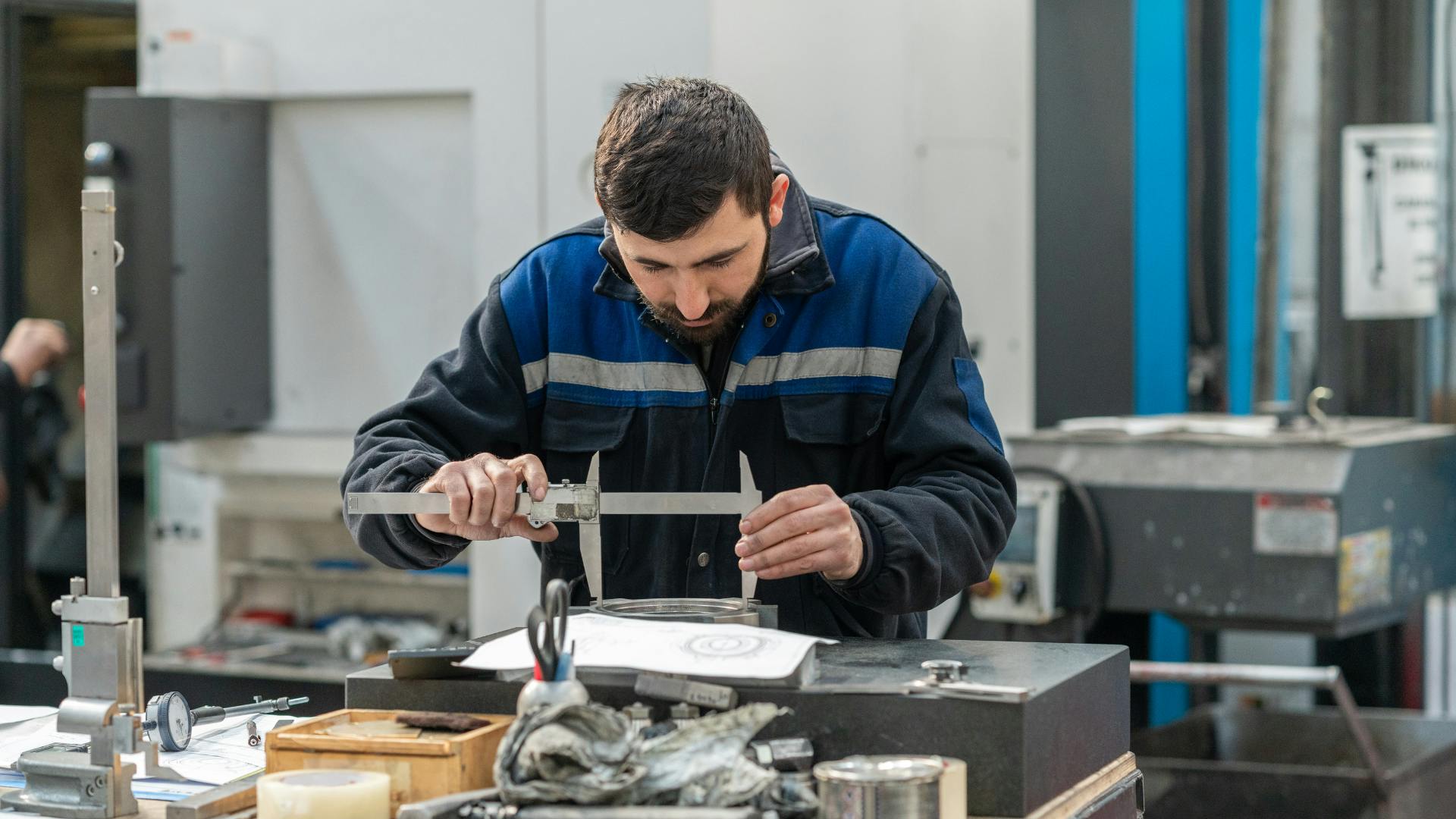 Man measuring the product sample precisely