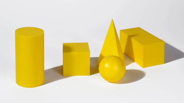 Different yellow 3d shapes