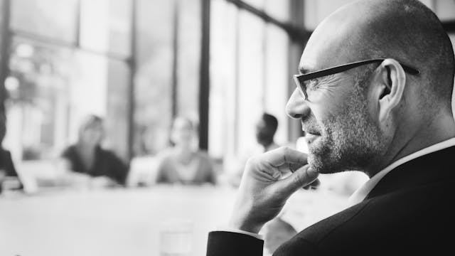 Man in corporate clothes smiling