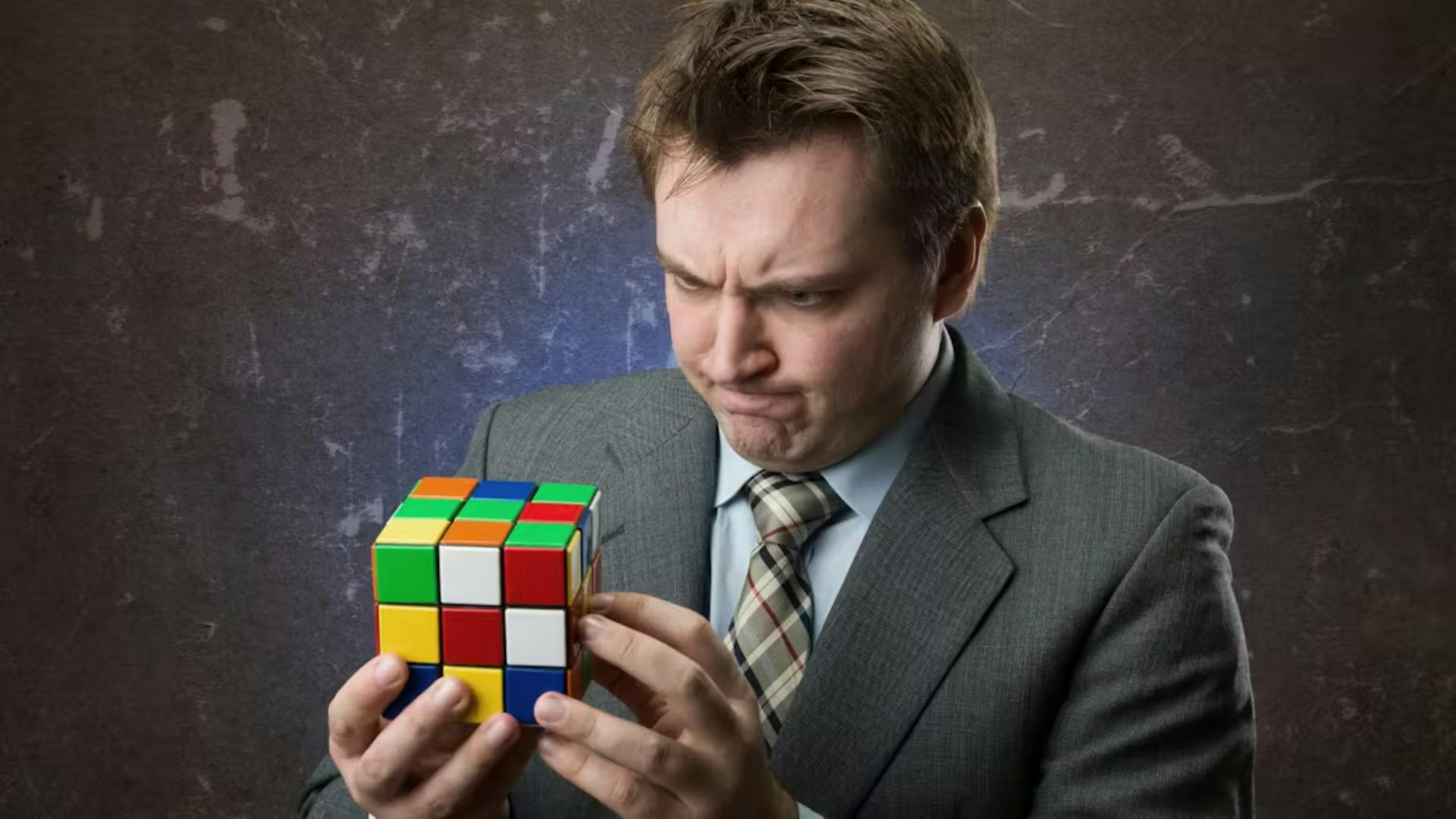 Man trying to solve puzzle