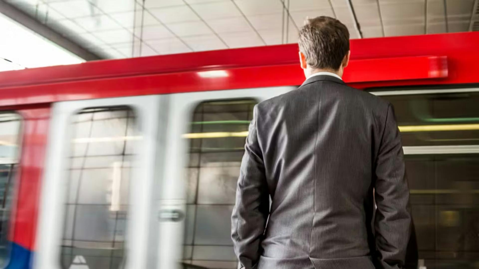 Man standing in the train station