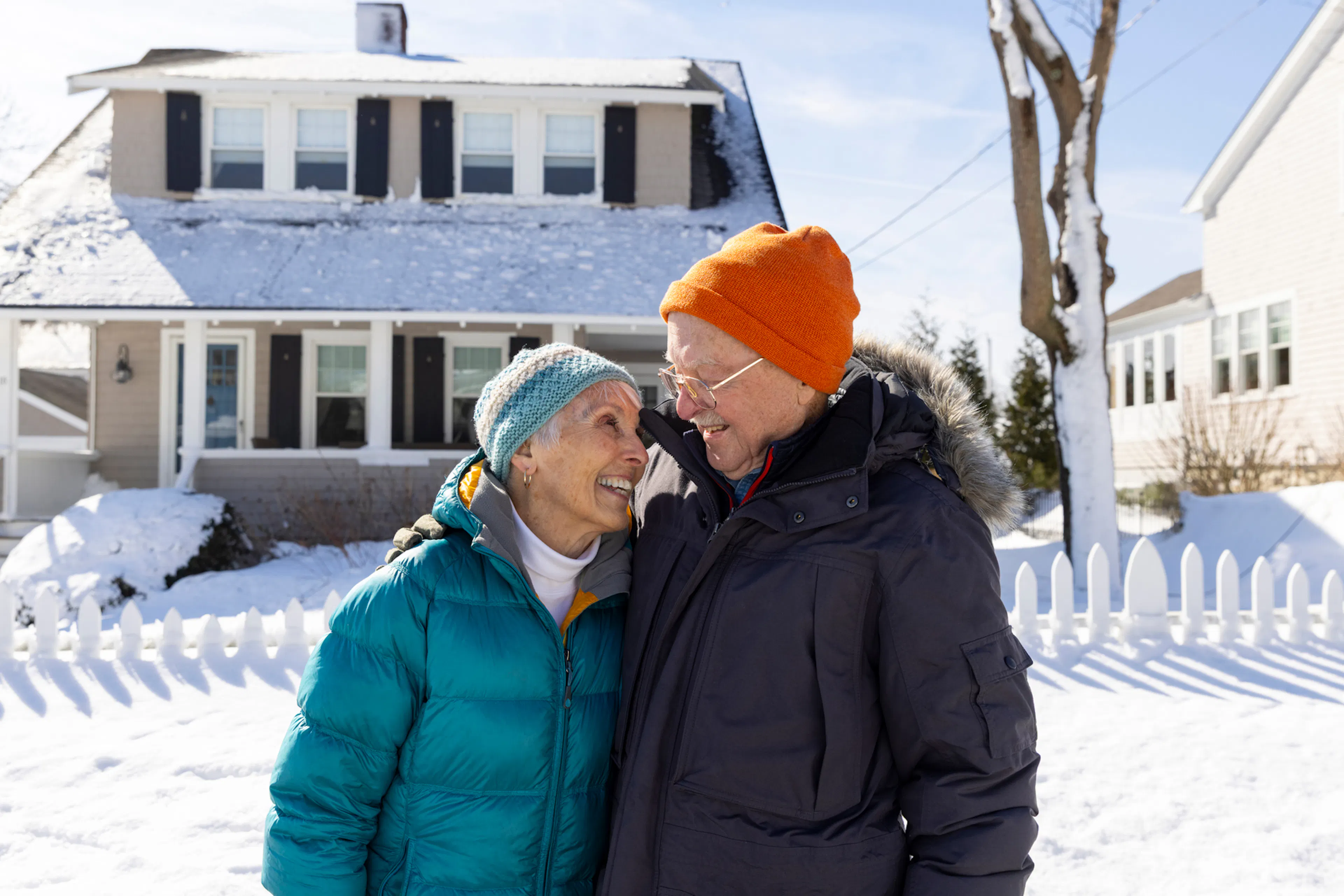 Elderly couple enjoying the snow