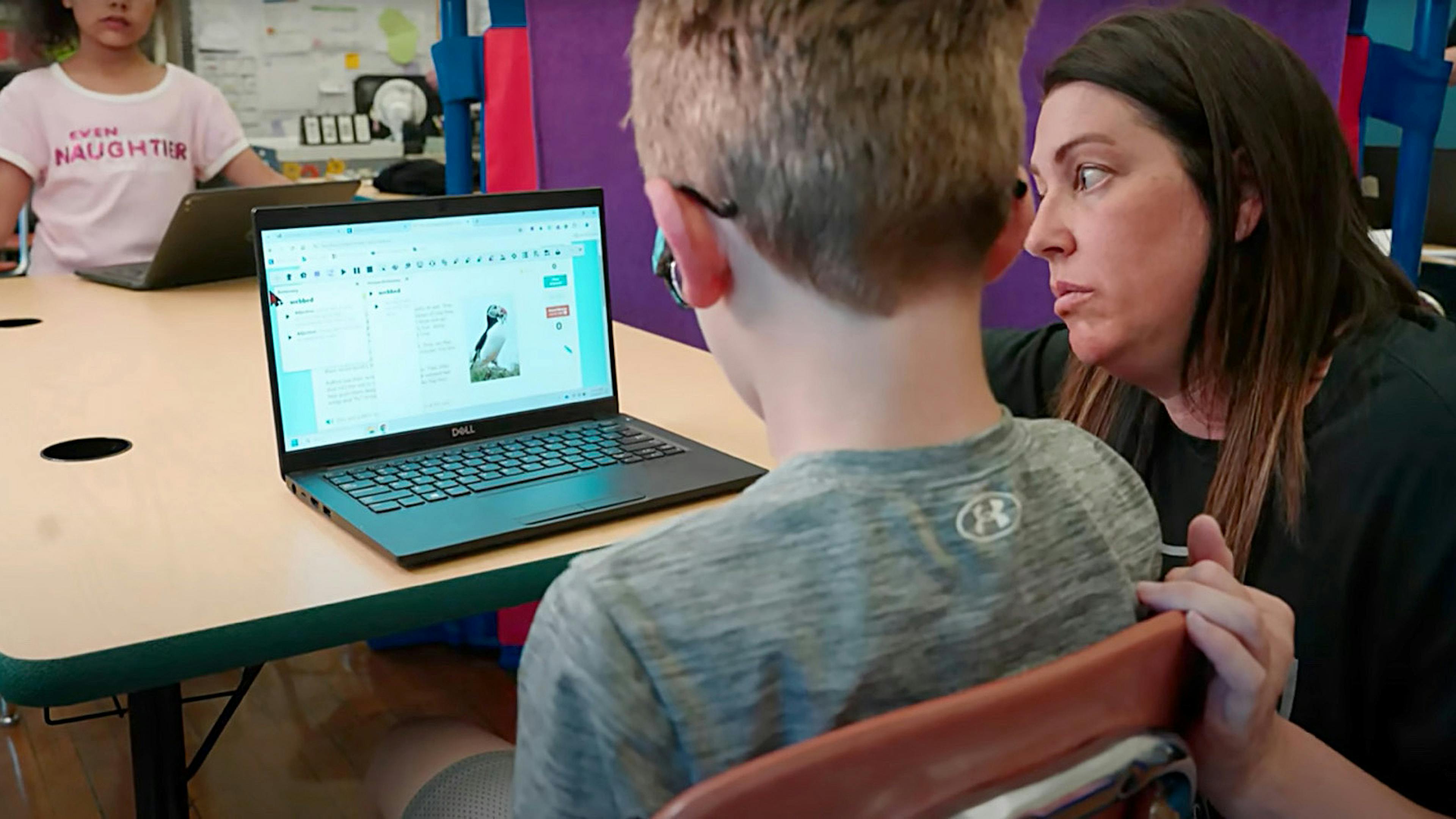 A student using Read&Write on a laptop in the classroom