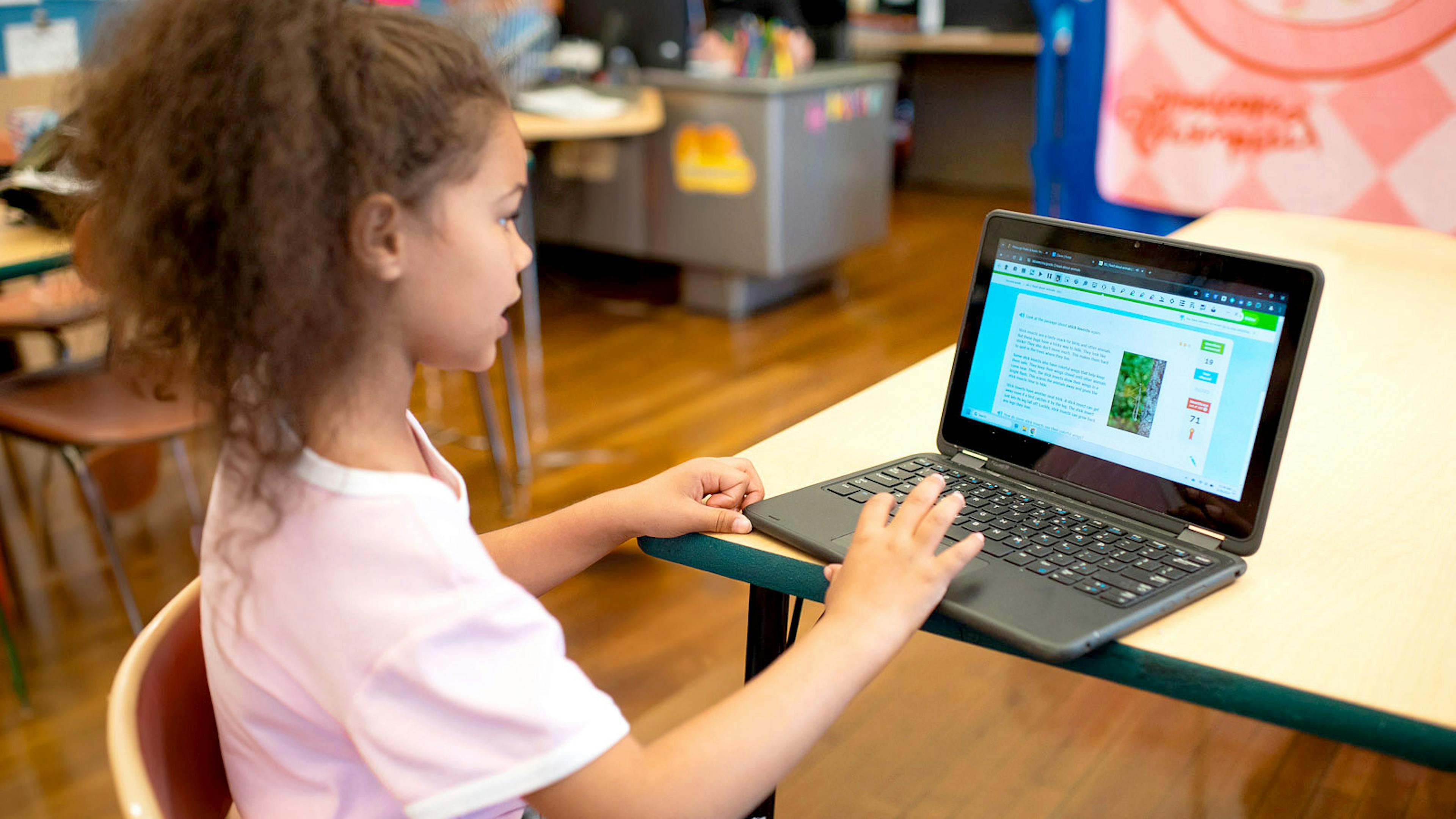 A student using Read&Write on a laptop