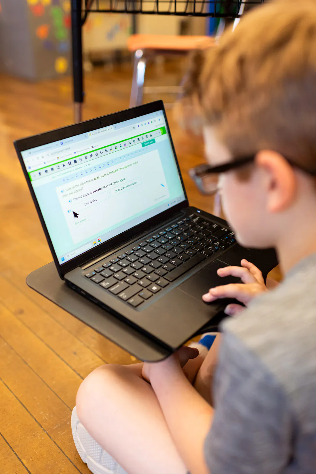 A student is using Read&Write on a laptop