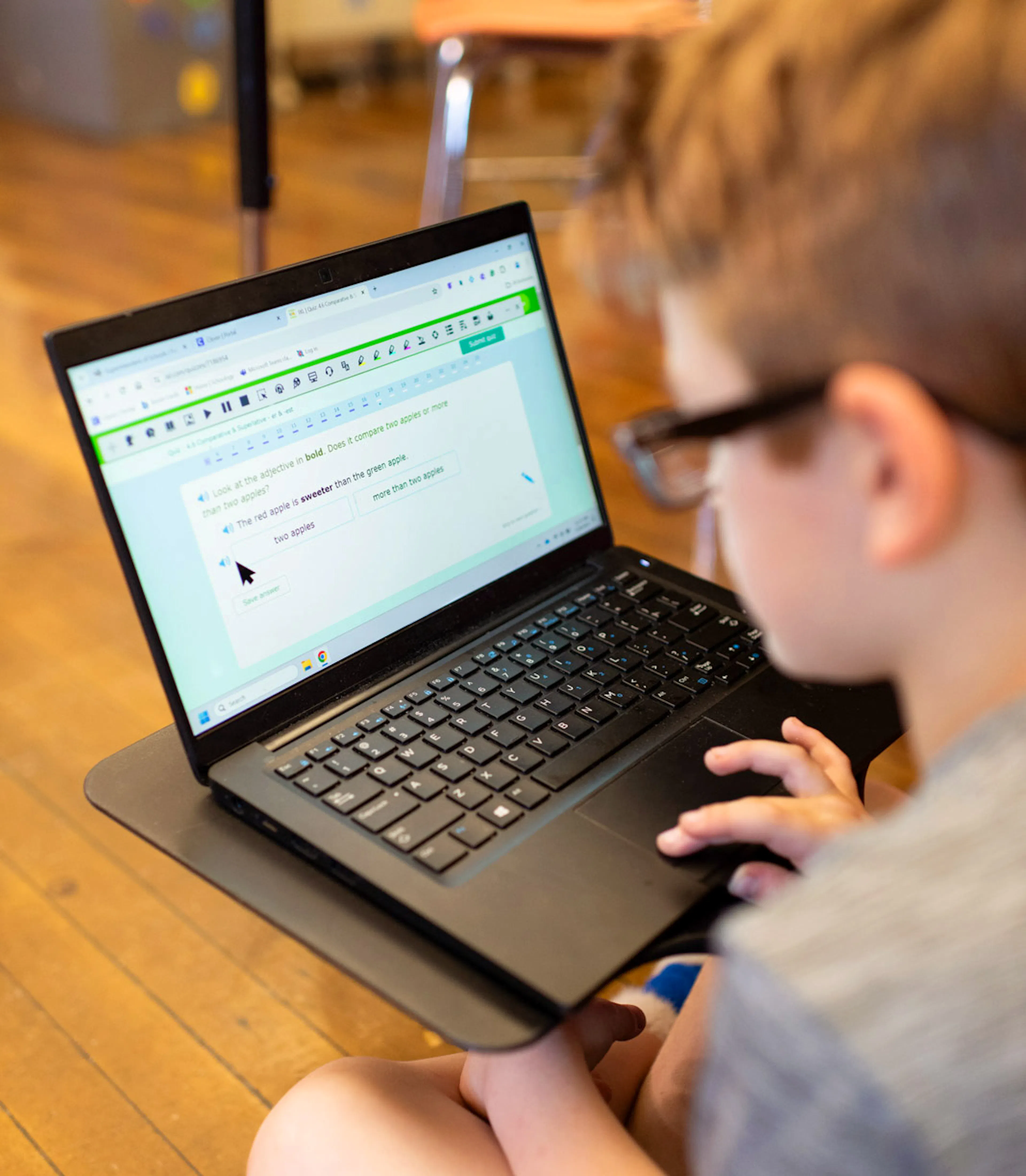 A student is using Read&Write on a laptop