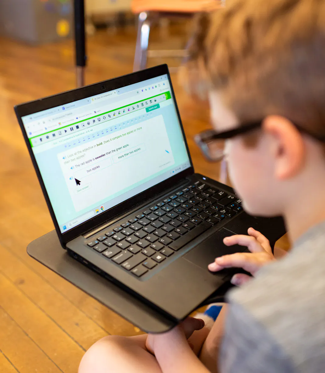 A student is using Read&Write on a laptop