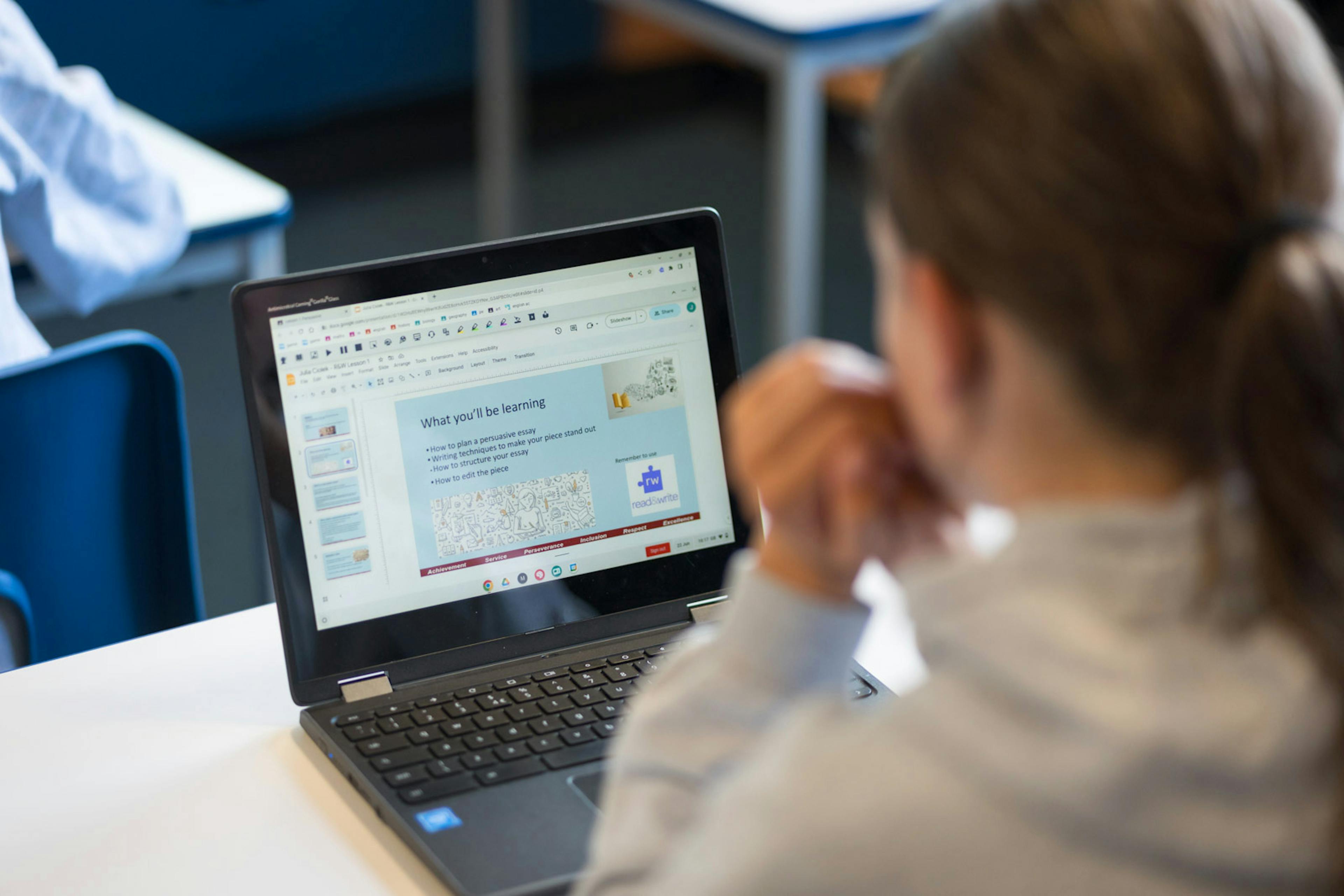 A student in school using Read&Write on a laptop