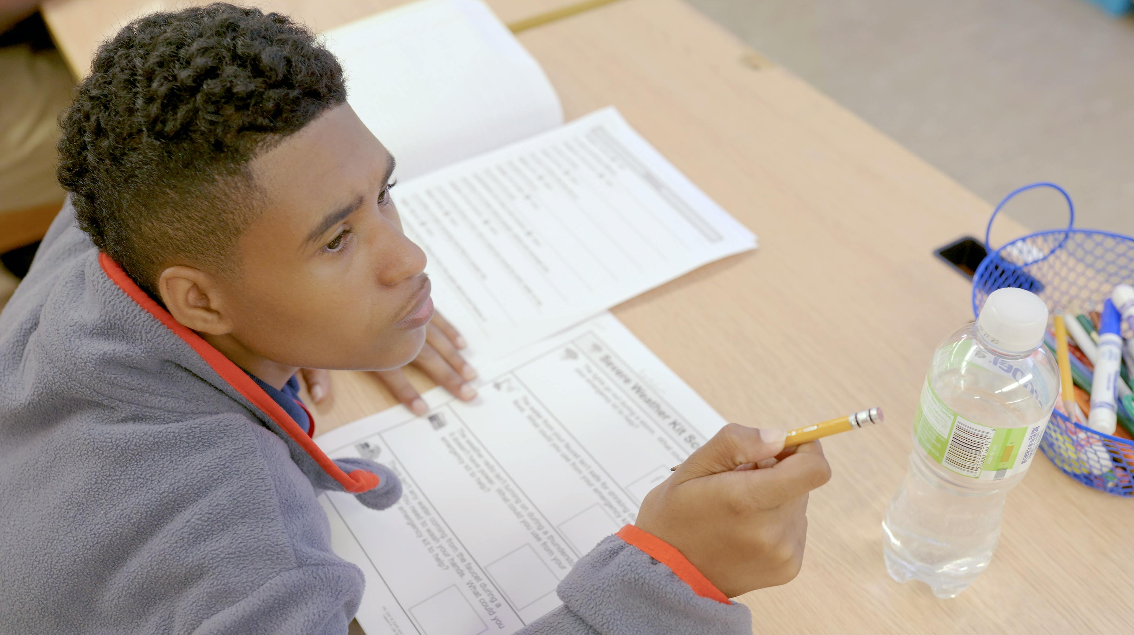 Students working at a desk 