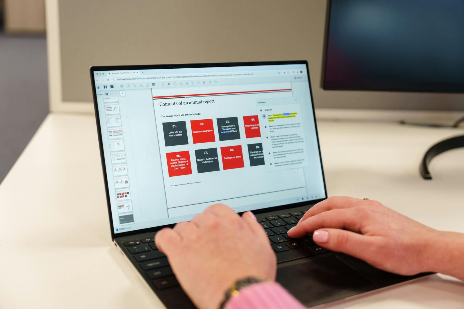 A pair of hands on a laptop keyboard