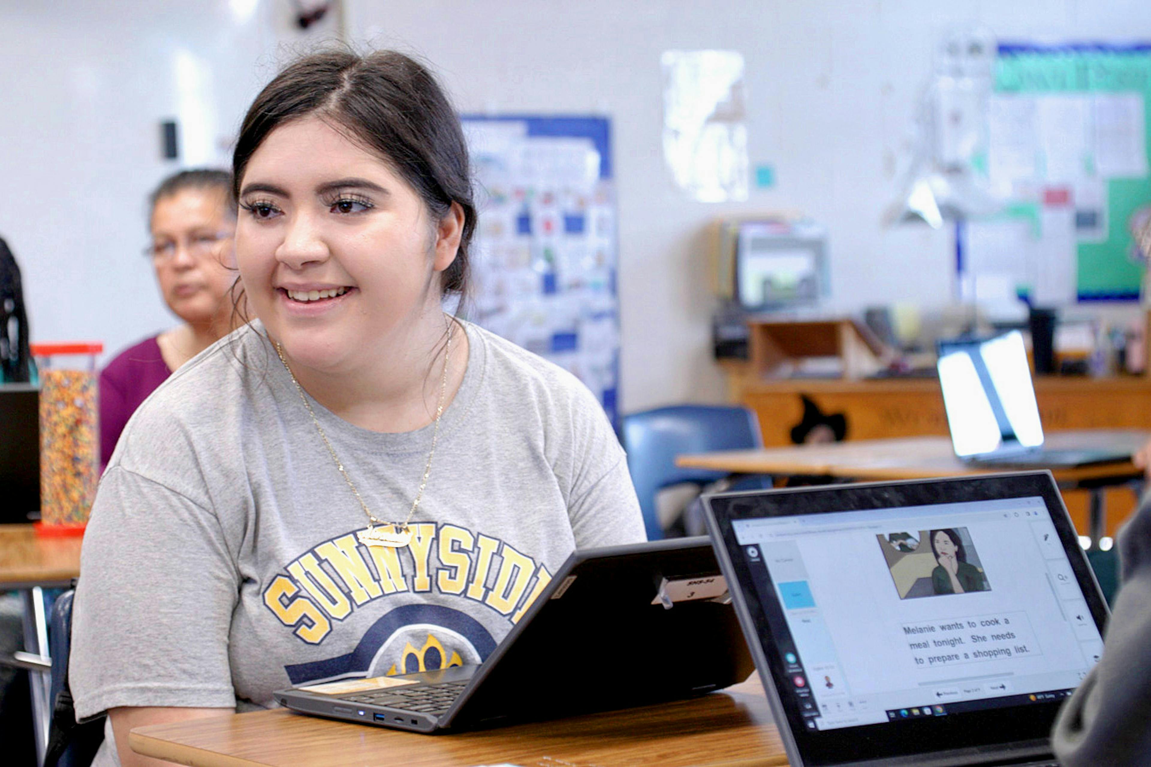 A student at school using a tablet device