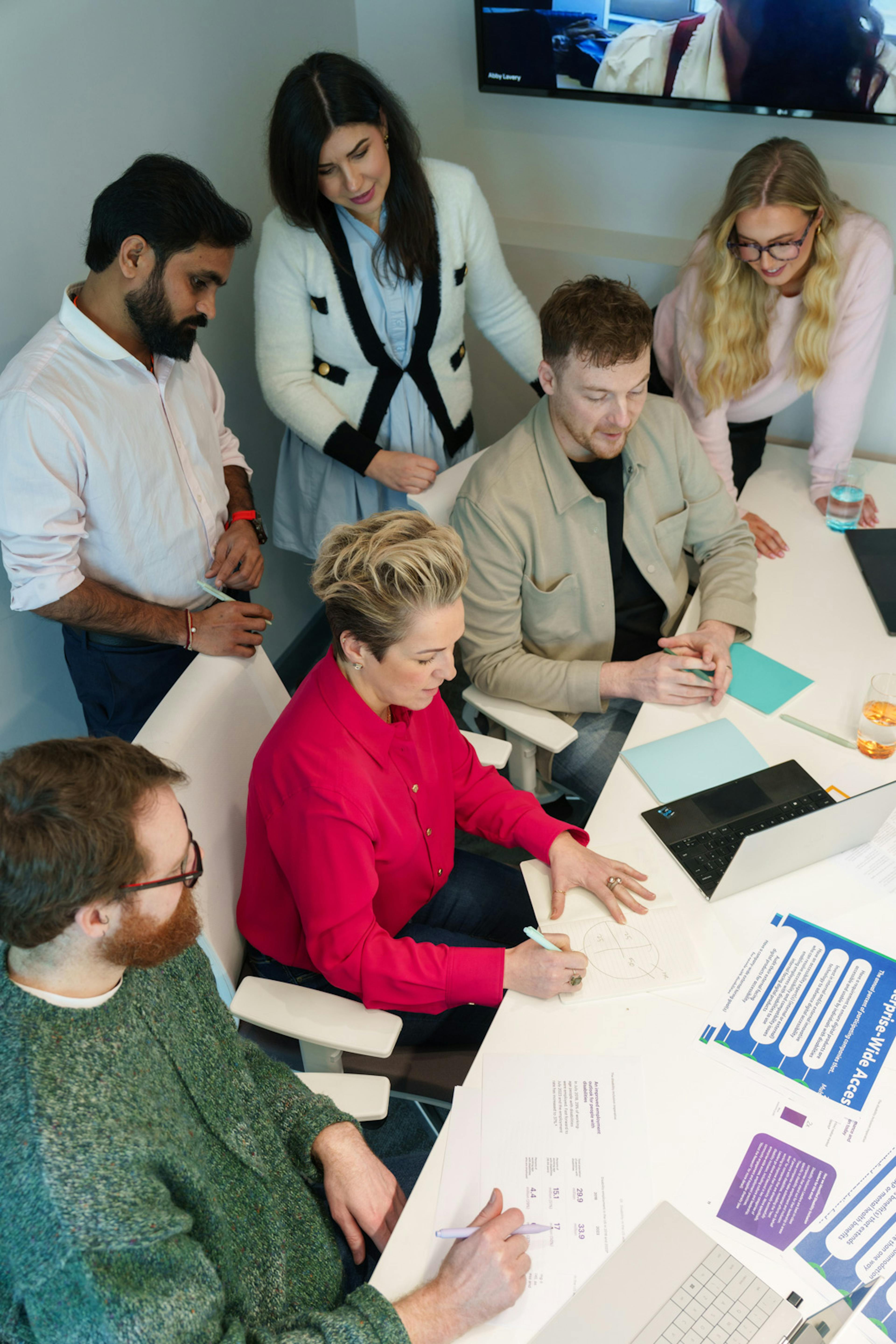 A group of Everway team members in a discussion