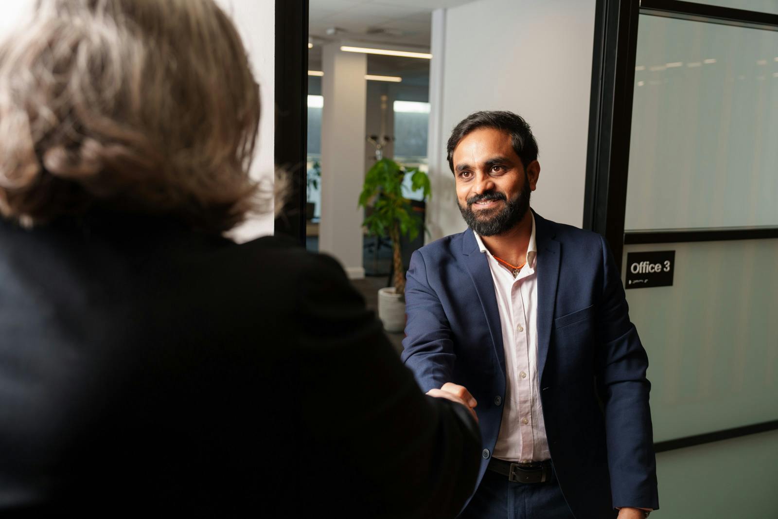 a man shaking someone's hand