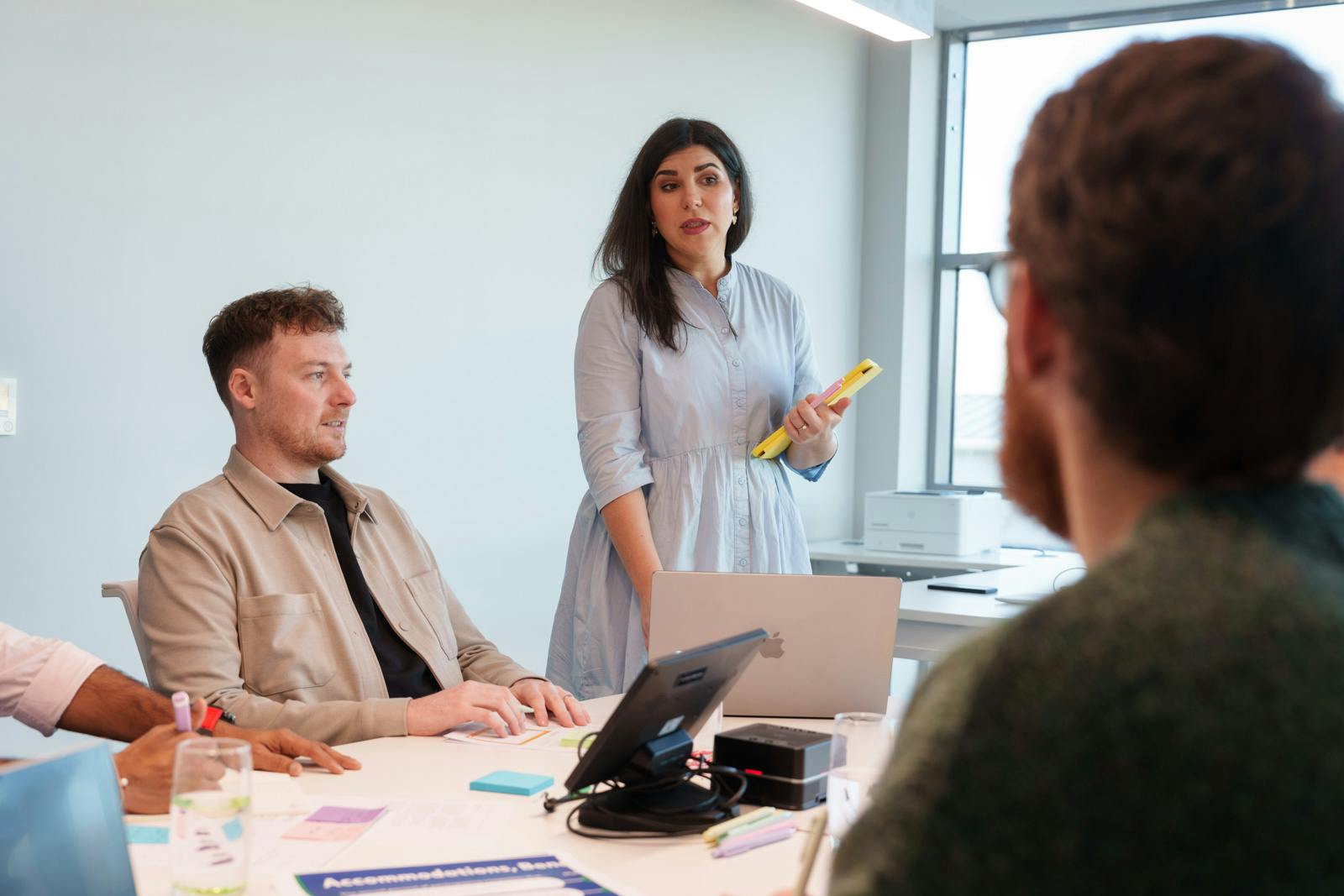 Members of a team around a table during a meeting