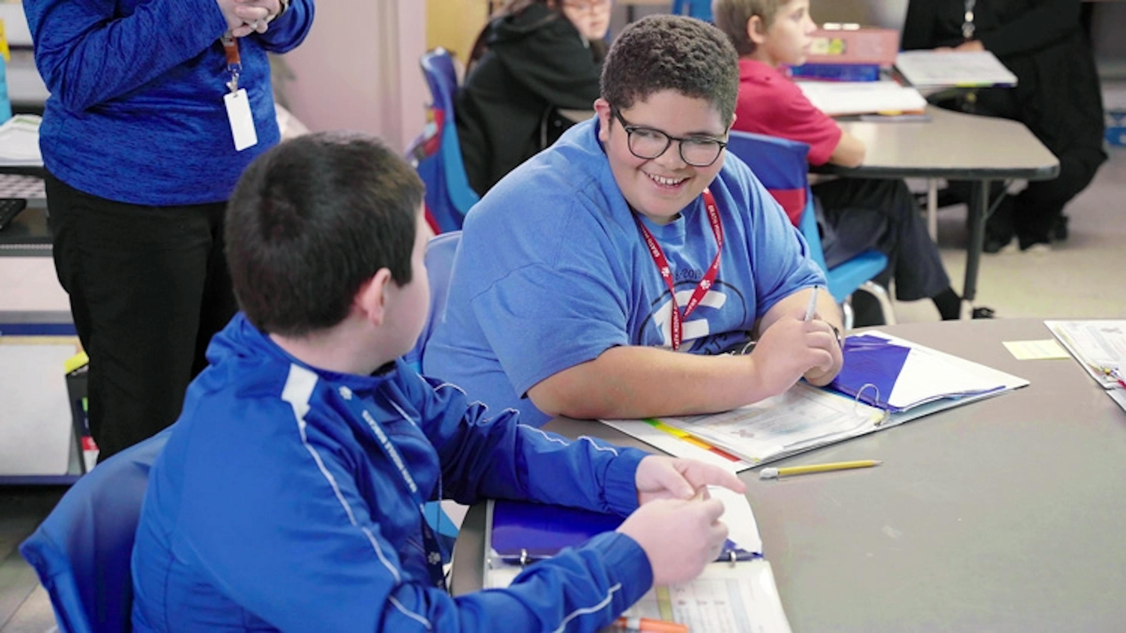 2 students at a desk