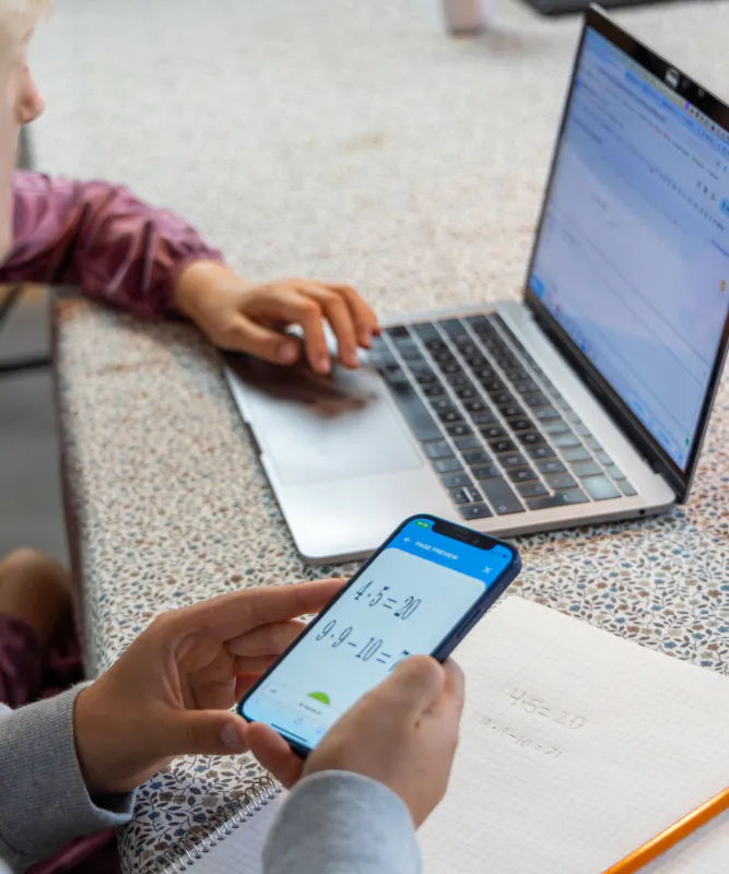 Two students using Equatio