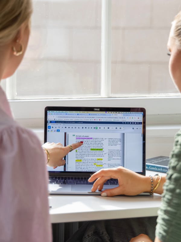 Two students using OrbitNote