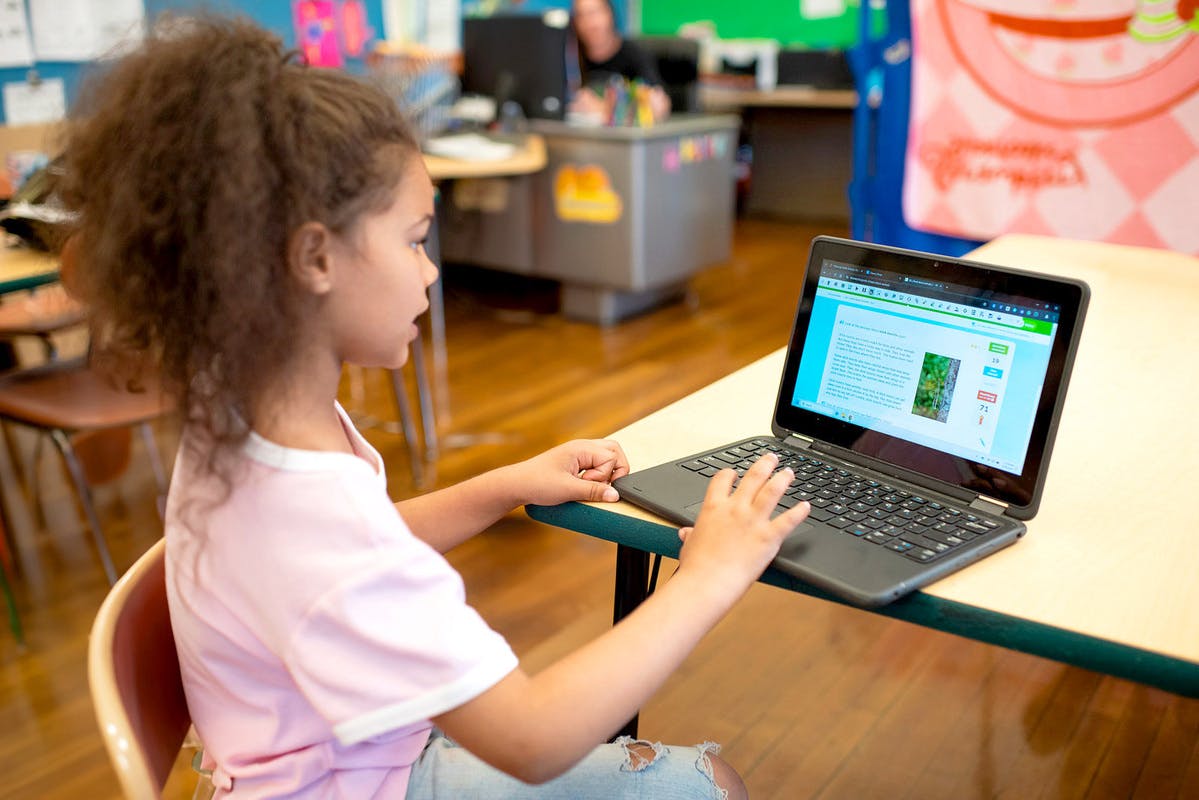 A student using Read&Write on a laptop