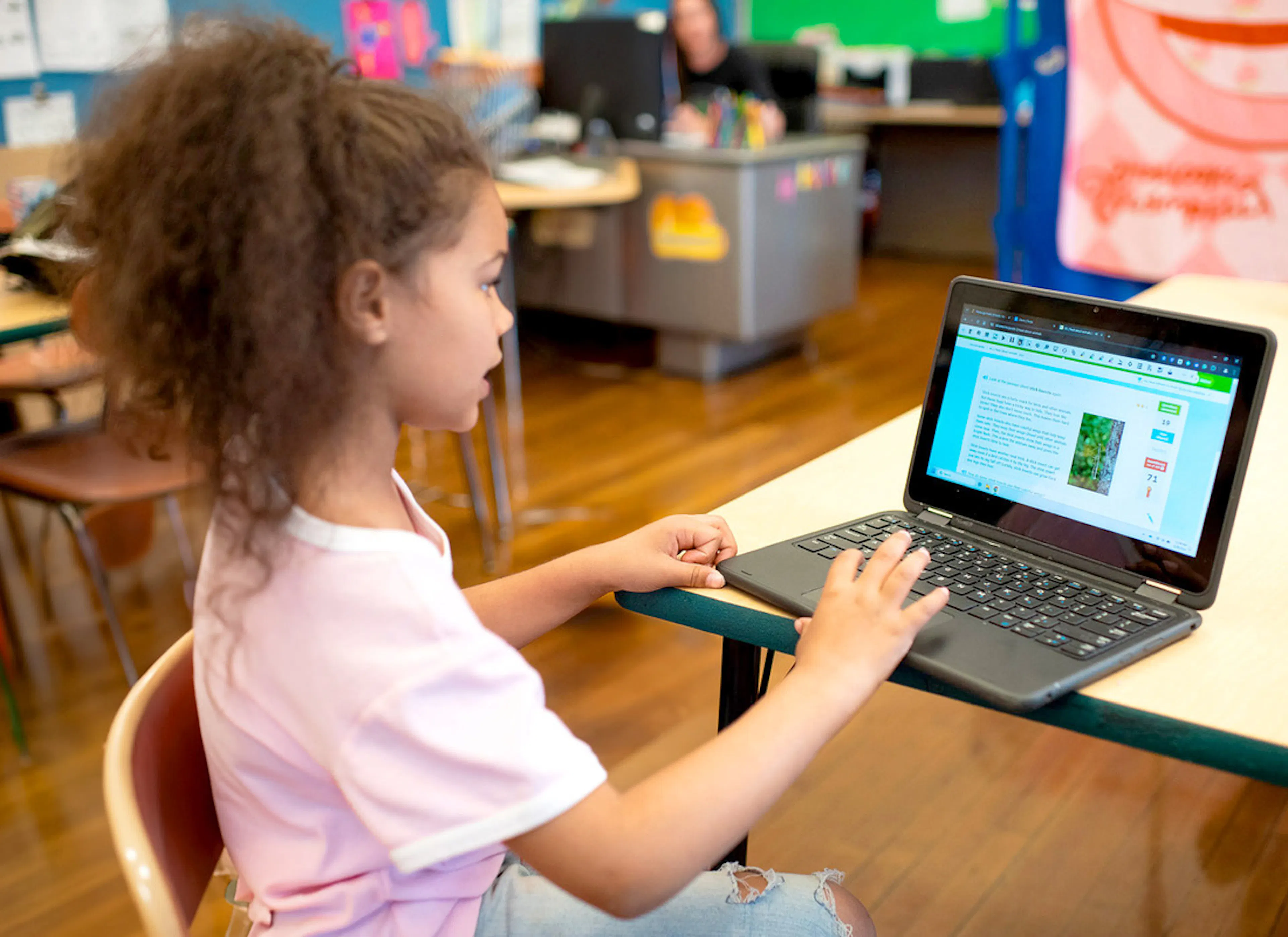 A student using Read&Write on a laptop