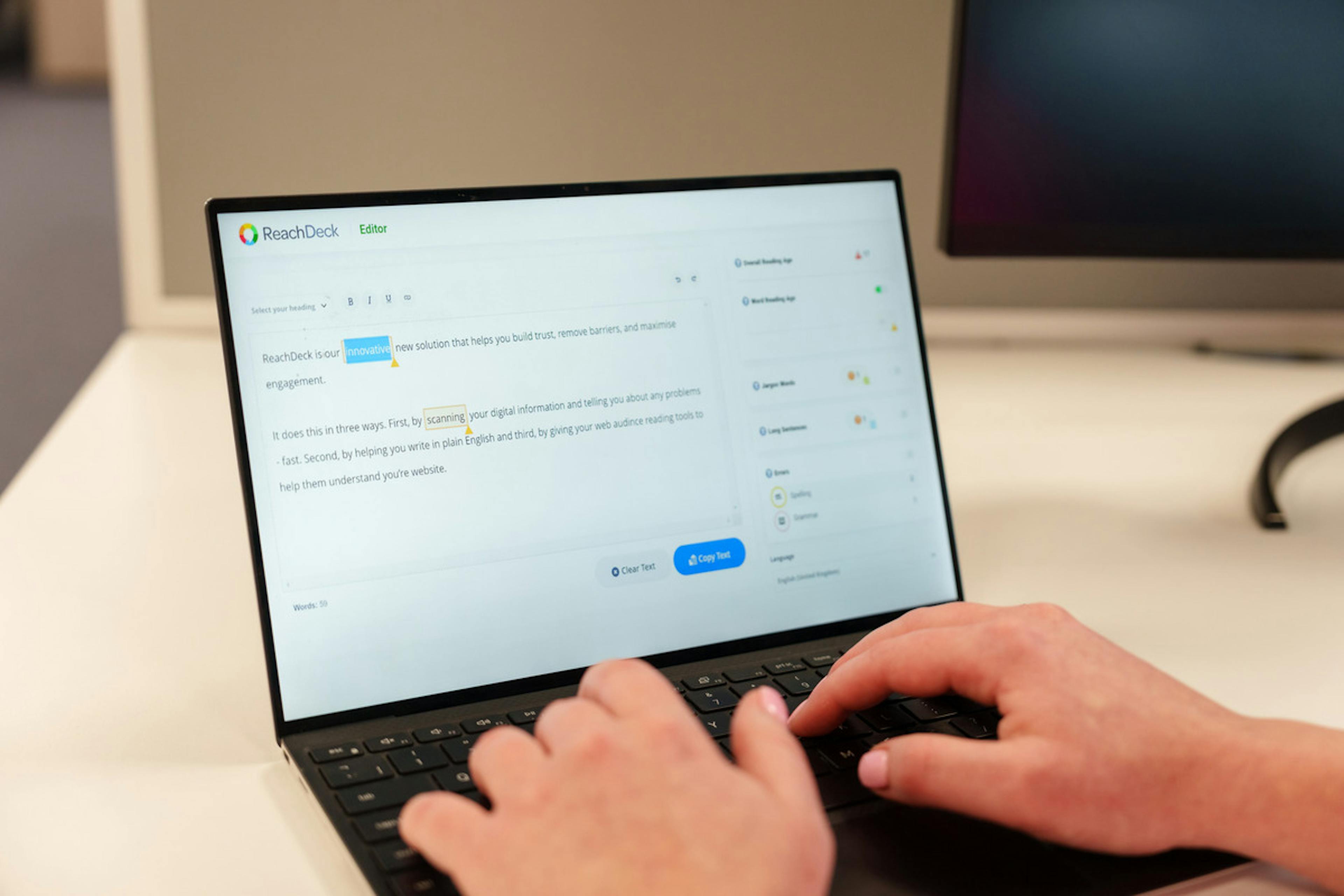 ReachDeck editor on a laptop