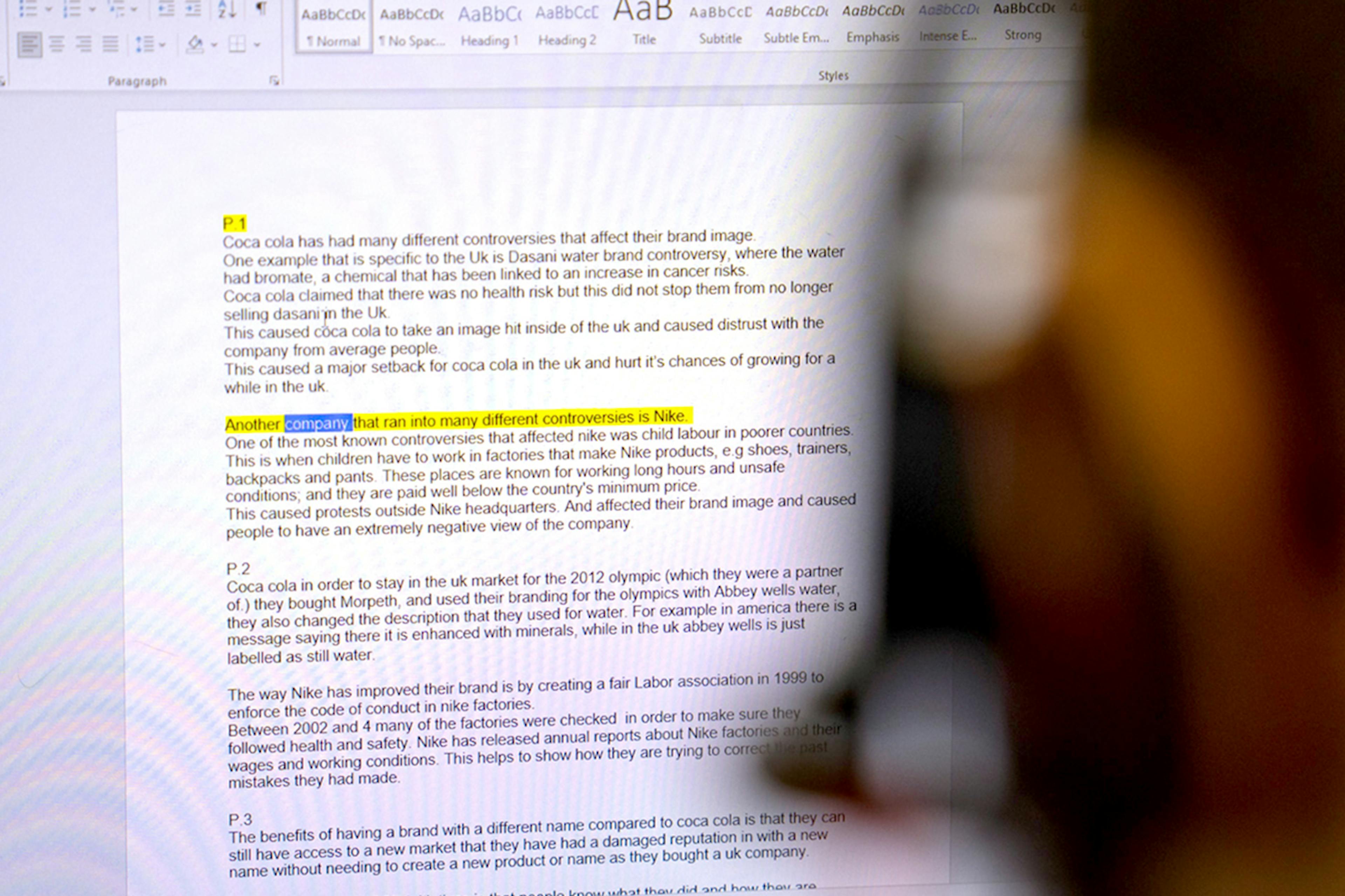 Over the shoulder photograph showing a student using Read&Writes text-to-speech software