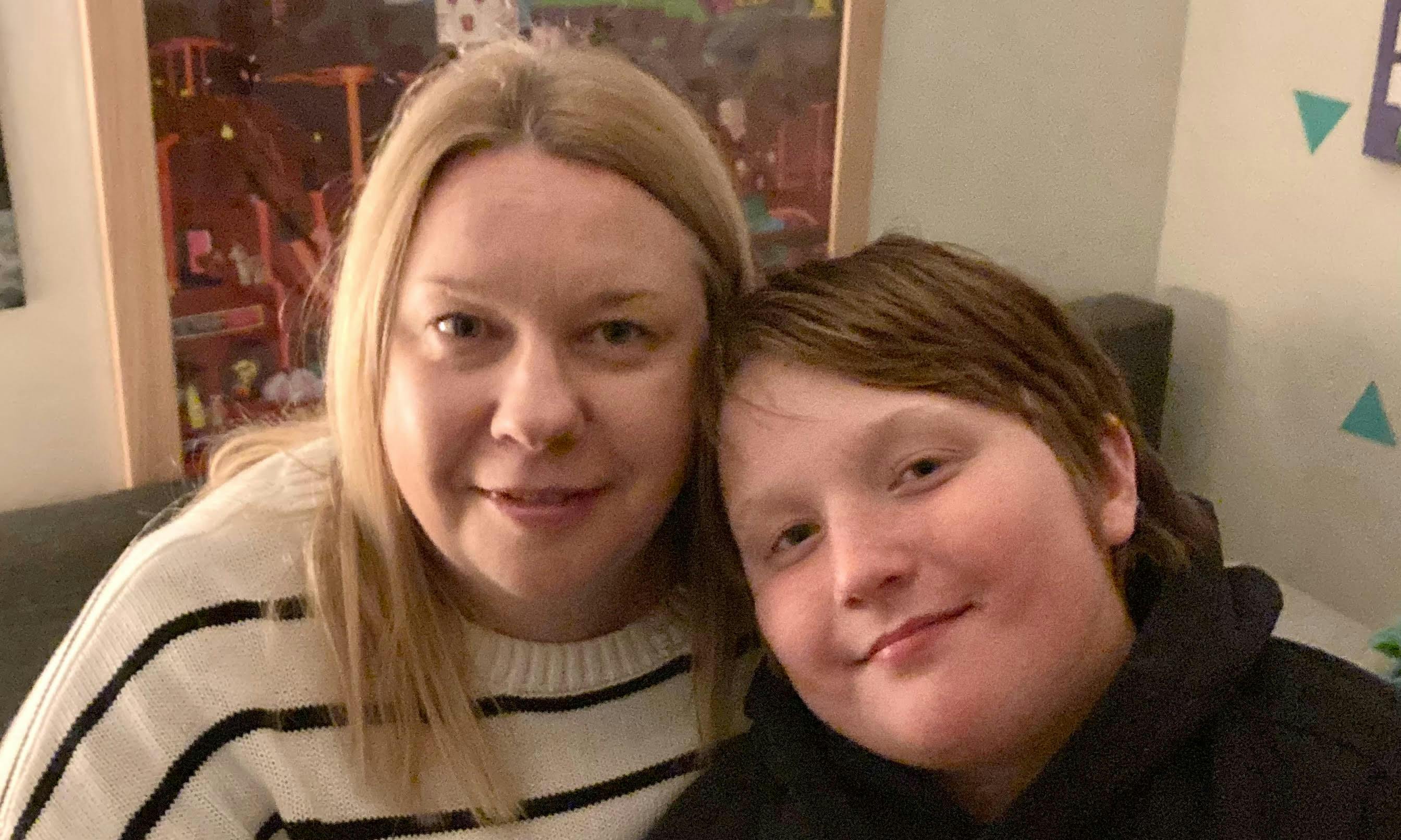 Photo of mother and son smiling