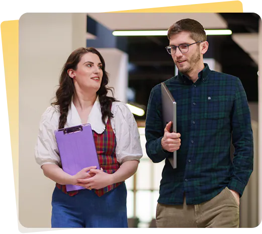Two Everway employees walking in an office