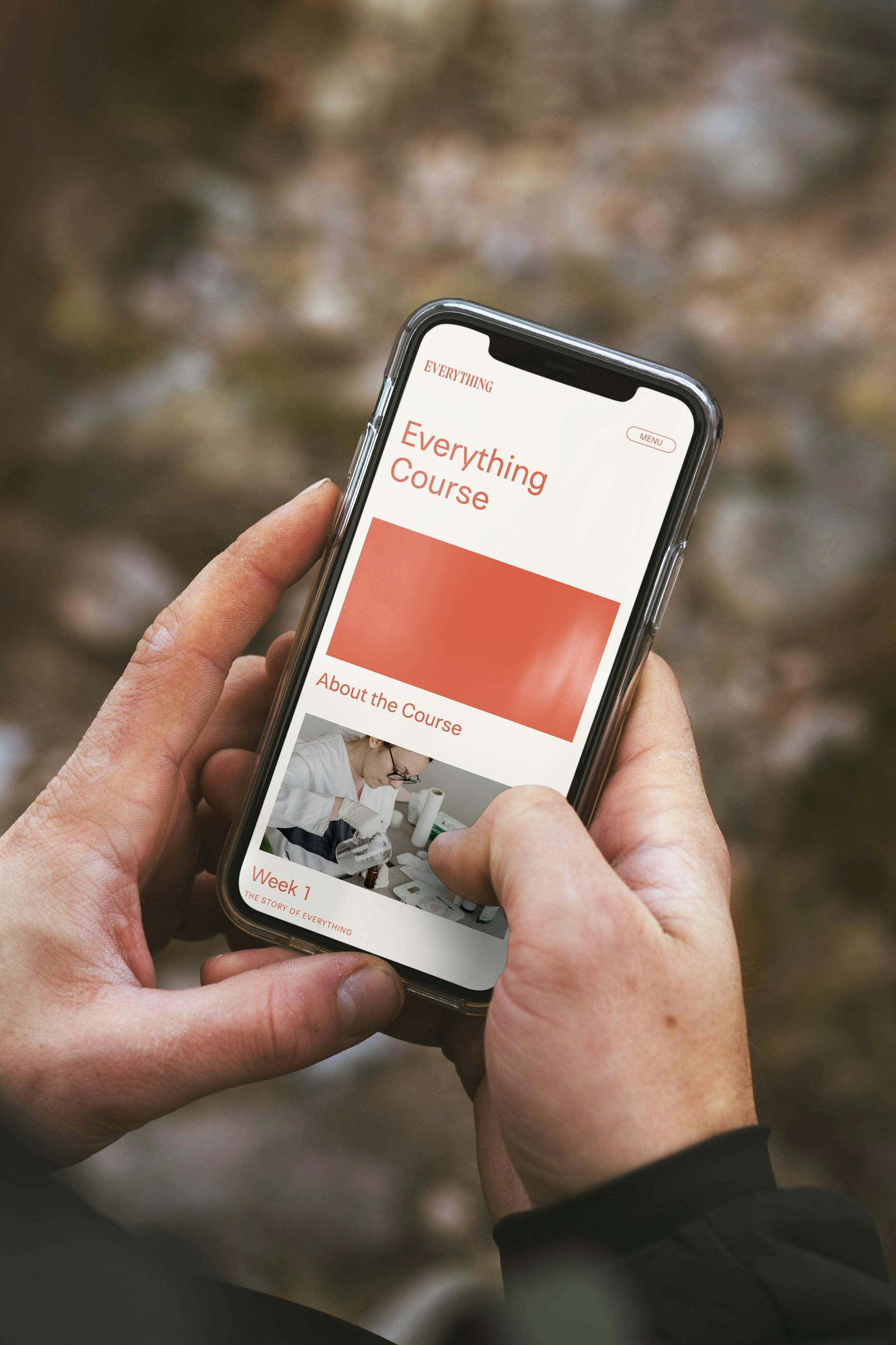 Mobile phone displaying Everything website.